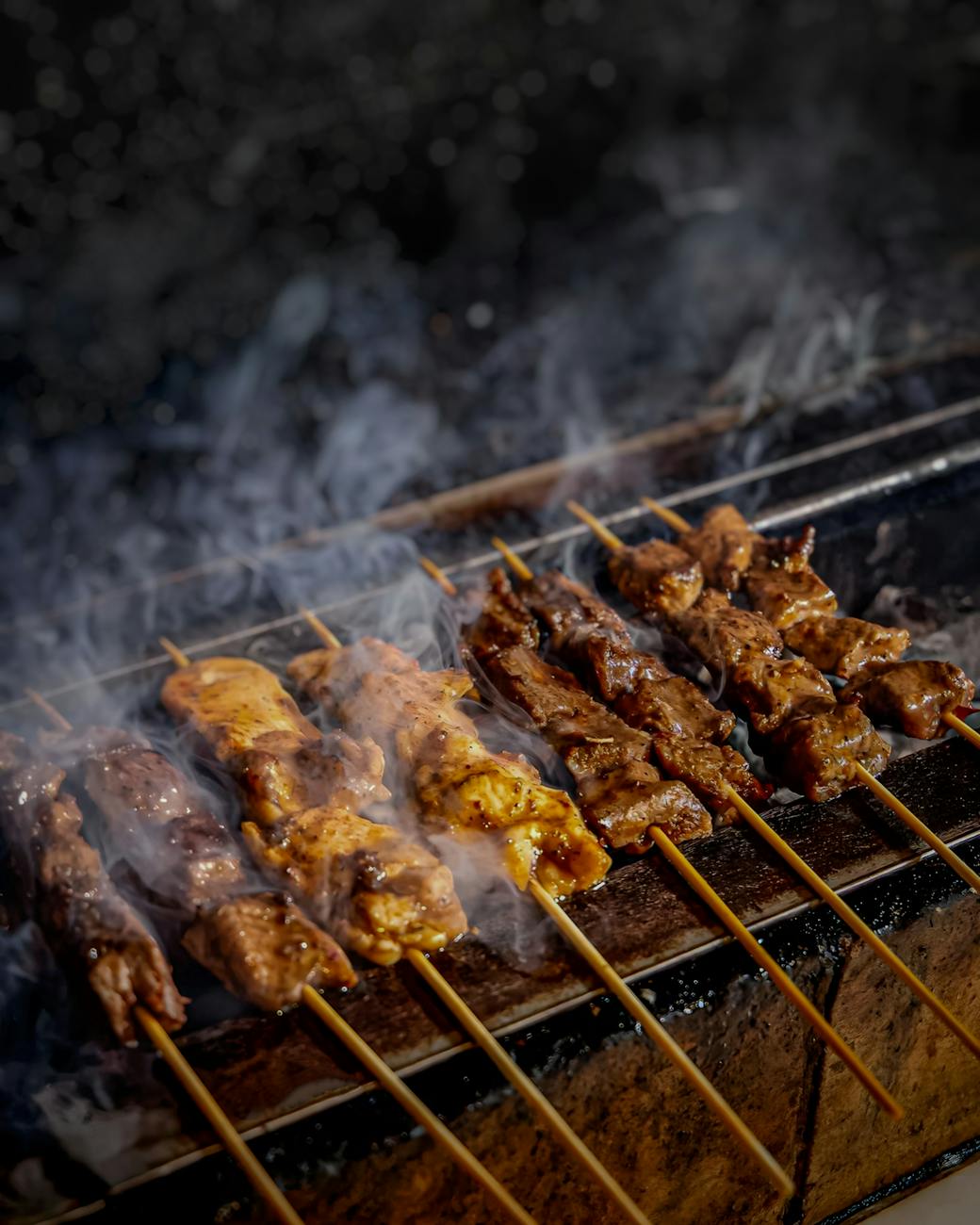 close up photo of chicken satay street food