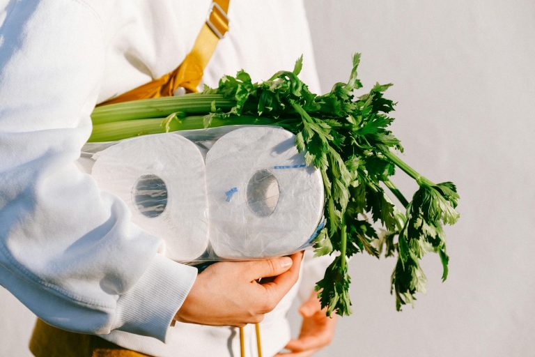 person in white long sleeve shirt tissue and vegetable